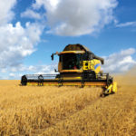 yellow harvester on the field